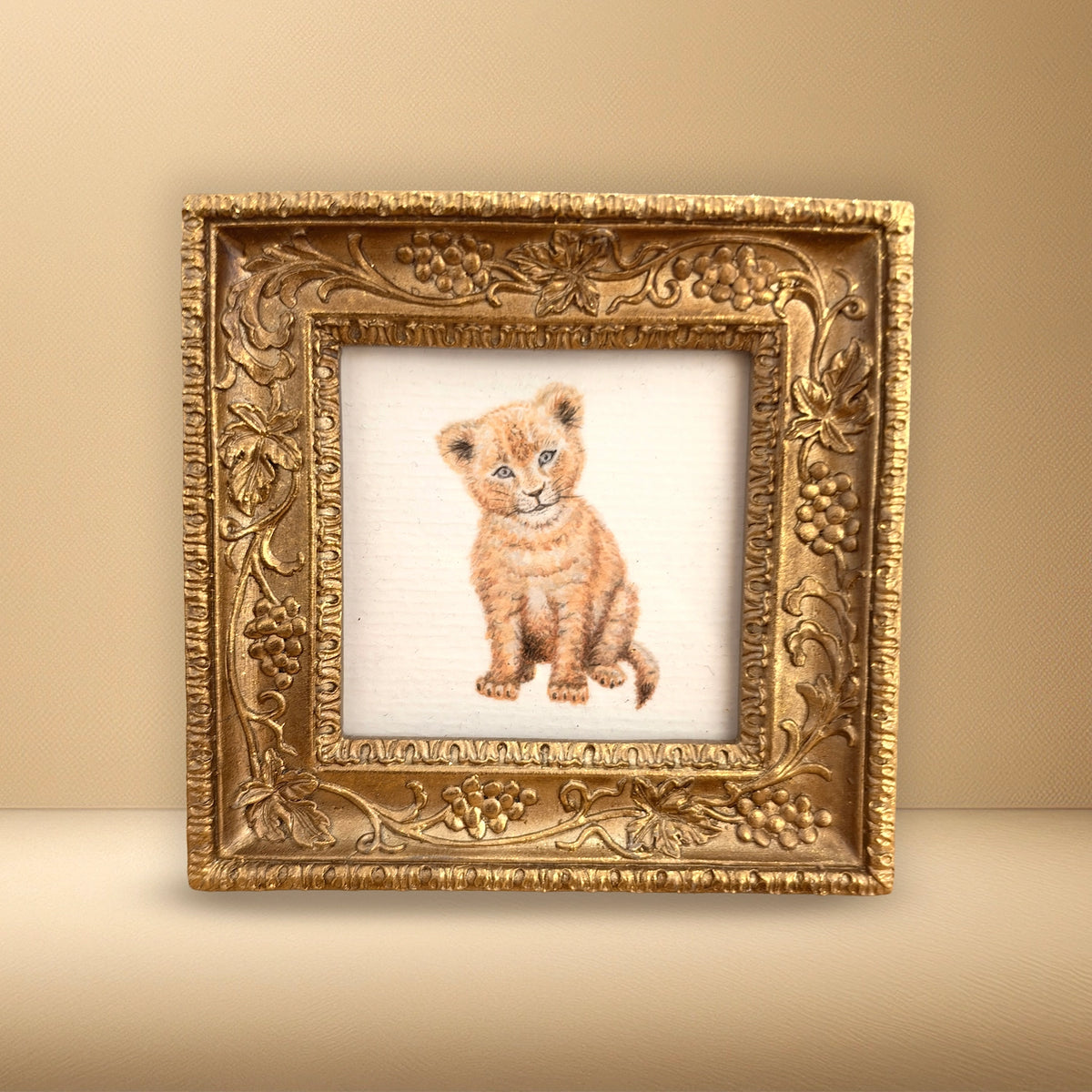 Goudkleurig lijstje met leeuwtje art print