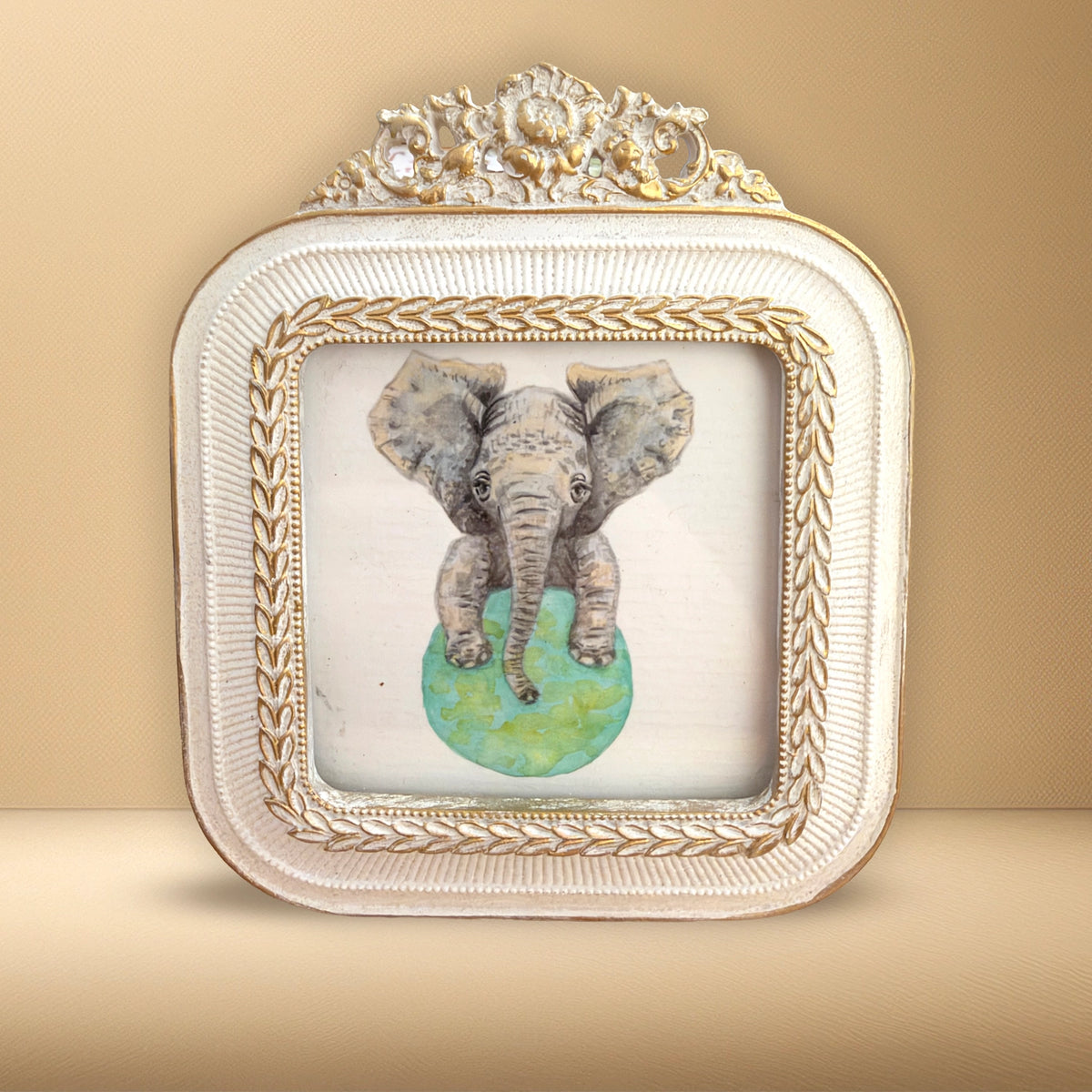 Gold colored bird frame with sloth art print
