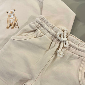 Baby joggingpak leeuwtje - vanille