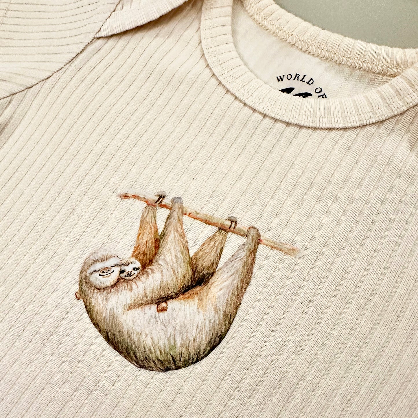 Meegroeiromper luiaard - vanille shortsleeve
